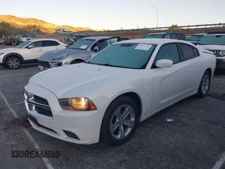 2013 Dodge Charger SE with VIN 2C3CDXBG1DH539849, listed as a IAAI auction lot 41673743 with 191,665 mi miles. Bid and sale history available at carsss.com. Image 2.