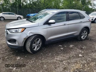 2020 Ford Edge SEL z VIN 2FMPK4J90LBB01731, wystawiony jako Copart lot #56919985 z przebiegiem 70 818 mil mil oraz Szkoda całkowita • Salvage title. Historia ofert i sprzedaży dostępna na DreamBid. Obrazek 1.