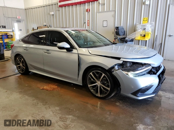 2022 Honda Civic Touring z VIN 2HGFE1F9XNH301080, wystawiony jako Copart lot #55320125 z przebiegiem 47 767 mil mil oraz Szkoda całkowita • Salvage title. Historia ofert i sprzedaży dostępna na DreamBid. Obrazek 4.