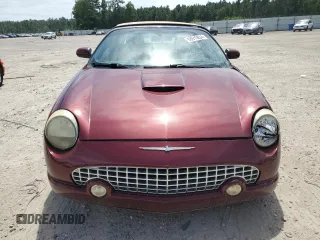 2004 Ford Thunderbird Deluxe z VIN 1FAHP60A64Y103060, wystawiony jako Copart lot #68915834 z przebiegiem 118 968 mil mil oraz Szkoda całkowita • Salvage title. Historia ofert i sprzedaży dostępna na DreamBid. Obrazek 5.