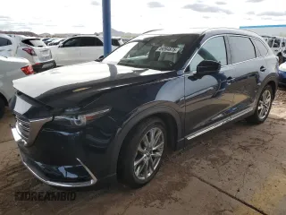 2018 Mazda CX-9 Grand Touring z VIN JM3TCADY2J0220873, wystawiony jako Copart lot #49264875 z przebiegiem Nie podano mil oraz Szkoda całkowita • Salvage title. Historia ofert i sprzedaży dostępna na DreamBid. Obrazek 1.