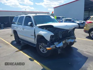 2003 Chevrolet Tahoe Z71 z VIN 1GNEK13Z13R284116, wystawiony jako IAAI lot #41890031 z przebiegiem 475 432 mil mil oraz . Historia ofert i sprzedaży dostępna na DreamBid. Obrazek 1.