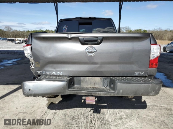 2021 Nissan Titan SV z VIN 1N6AA1EFXMN518756, wystawiony jako Copart lot #44969775 z przebiegiem 101 589 mil mil oraz Szkoda całkowita • Salvage title. Historia ofert i sprzedaży dostępna na DreamBid. Obrazek 6.