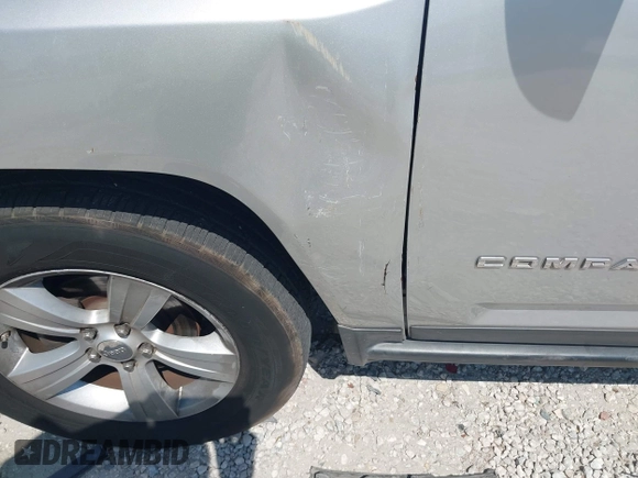 2012 Jeep Compass Sport with VIN 1C4NJCBA7CD660091, listed as a IAAI auction lot 42113038 with 123,181 mi miles. Bid and sale history available at carsss.com. Image 14.