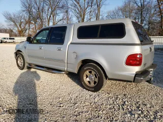 2003 Ford F-150 XLT with VIN 1FTRW07663KD78428, listed as a Copart auction lot 52673764 with 201,309 mi miles and Non Repairable. Bid and sale history available at carsss.com. Image 2.