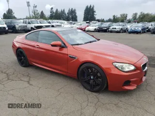2014 BMW M6 z VIN WBSLX9C52ED160071, wystawiony jako Copart lot #77452554 z przebiegiem 64 814 mil mil oraz Szkoda całkowita • Salvage title. Historia ofert i sprzedaży dostępna na DreamBid. Obrazek 4.