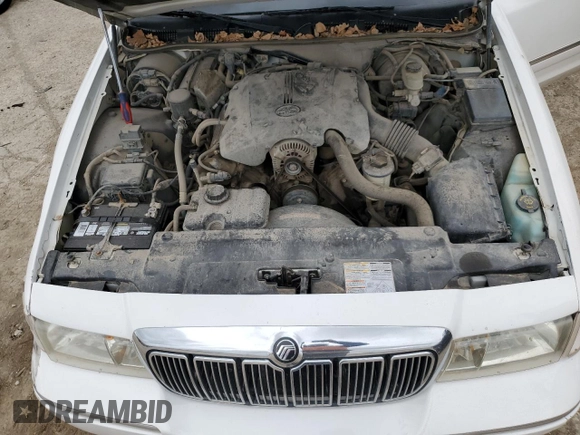 1999 Mercury Grand Marquis GS z VIN 2MEFM74W0XX670924, wystawiony jako Copart lot #51811055 z przebiegiem 176 559 mil mil oraz Szkoda całkowita • Salvage title. Historia ofert i sprzedaży dostępna na DreamBid. Obrazek 11.