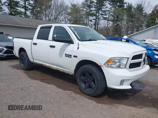 2015 Ram 1500 Express z VIN 1C6RR7KT3FS647476, wystawiony jako IAAI lot #41987391 z przebiegiem 150 000 mil mil oraz . Historia ofert i sprzedaży dostępna na DreamBid. Obrazek 1.