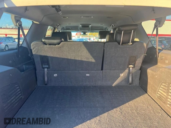 2015 Chevrolet Suburban with VIN 1GNSKHEC4FR25217, listed as a Copart auction lot 65346775 with 213,363 mi miles and Clean title. Bid and sale history available at DreamBid. Image 7.