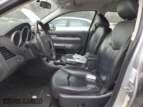 2009 Chrysler Sebring Touring with VIN 1C3LC56B99N564888, listed as a Copart auction lot 88457795 with Not provided miles and Salvage title. Bid and sale history available at DreamBid. Image 7.