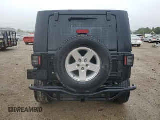 2008 Jeep Wrangler X z VIN 1J8FA24168L646281, wystawiony jako Copart lot #57689895 z przebiegiem 205 348 mil mil oraz Szkoda całkowita • Salvage title. Historia ofert i sprzedaży dostępna na DreamBid. Obrazek 6.