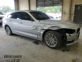 2015 BMW 3 Series 328i Gran Turismo xDrive with VIN WBA3X5C58FD561445, listed as a Copart auction lot 57328295 with 121,515 mi miles and Salvage title. Bid and sale history available at DreamBid. Image 4.