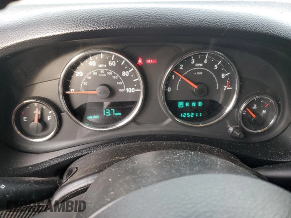 2014 Jeep Wrangler Unlimited Sport with VIN 1C4HJWDG6EL280653, listed as a Copart auction lot 48851205 with 125,211 mi miles and Salvage Title. Bid and sale history available at DreamBid. Image 9.