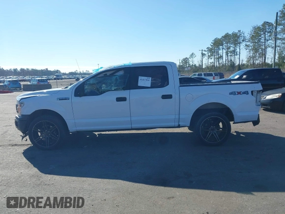 2018 Ford F-150 XL with VIN 1FTEW1EB3JKF67829, listed as a IAAI auction lot 41417816 with 219,899 mi miles and . Bid and sale history available at carsss.com. Image 14.