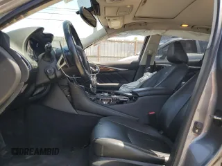 2014 Infiniti Q50 Sport with VIN JN1BV7APXEM687358, listed as a Copart auction lot 52028215 with 109,855 mi miles and Salvage Title. Bid and sale history available at DreamBid. Image 7.