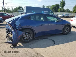 2023 Toyota Prius LE z VIN JTDACAAU8P3000694, wystawiony jako Copart lot #63066504 z przebiegiem 34 371 mil mil oraz Szkoda całkowita • Salvage title. Historia ofert i sprzedaży dostępna na DreamBid. Obrazek 3.