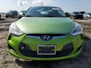 2012 Hyundai Veloster w/Gray Int z VIN KMHTC6AD1CU066882, wystawiony jako Copart lot #55781745 z przebiegiem 167 427 mil mil oraz Czysty tytuł • Clean title. Historia ofert i sprzedaży dostępna na DreamBid. Obrazek 5.