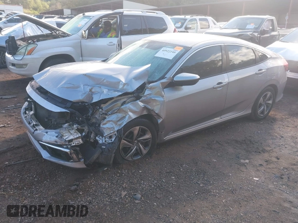 2020 Honda Civic LX z VIN 2HGFC2F60LH549739, wystawiony jako IAAI lot #40922240 z przebiegiem 127 958 mil mil oraz . Historia ofert i sprzedaży dostępna na DreamBid. Obrazek 17.