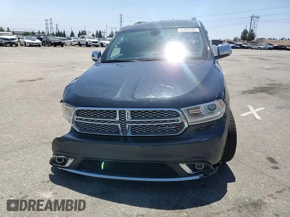 2014 Dodge Durango Citadel with VIN 1C4SDJET1EC594240, listed as a Copart auction lot 58090285 with 160,027 mi miles and Salvage title. Bid and sale history available at DreamBid. Image 14.