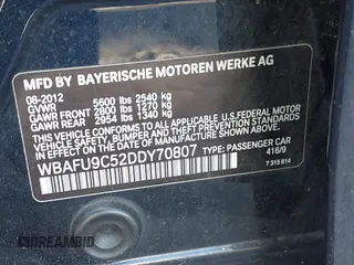 2013 BMW 5 Series 550i xDrive with VIN WBAFU9C52DDY70807, listed as a IAAI auction lot 41902163 with 92,021 mi miles and . Bid and sale history available at carsss.com. Image 9.