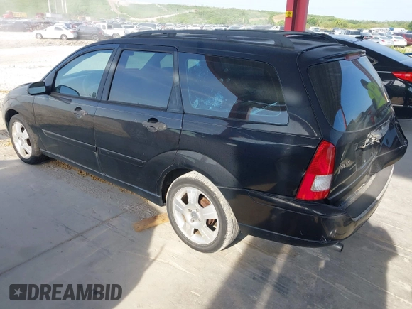2004 Ford Focus ZTW with VIN 1FAFP35Z64W173237, listed as a IAAI auction lot 42685899 with 209,690 mi miles and . Bid and sale history available at DreamBid. Image 3.