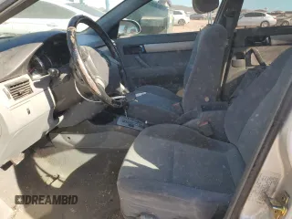2006 Suzuki Forenza Premium z VIN KL5JJ56Z36K268290, wystawiony jako Copart lot #88509495 z przebiegiem 199 303 mil mil oraz Szkody całkowita. Historia ofert i sprzedaży dostępna na DreamBid. Obrazek 7.