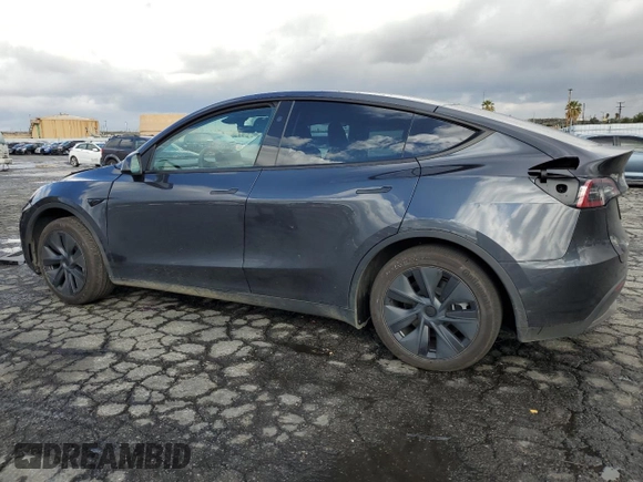 2024 Tesla Model Y Long Range z VIN 7SAYGAEE1RF107617, wystawiony jako Copart lot #48224405 z przebiegiem 10 637 mil mil oraz Szkoda całkowita • Salvage title. Historia ofert i sprzedaży dostępna na DreamBid. Obrazek 2.