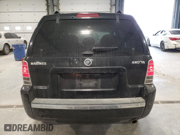 2005 Mercury Mariner Luxury z VIN 4M2YU57145DJ26214, wystawiony jako Copart lot #42154255 z przebiegiem Nie podano mil oraz Tytuł czysty. Historia ofert i sprzedaży dostępna na DreamBid. Obrazek 6.