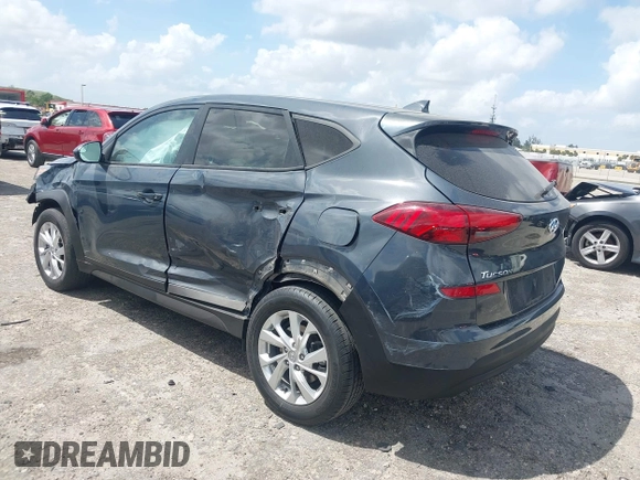 2021 Hyundai Tucson SE with VIN KM8J23A41MU291085, listed as a IAAI auction lot 41956974 with 93,932 mi miles. Bid and sale history available at carsss.com. Image 3.