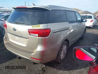 2015 Kia Sedona LX with VIN KNDMB5C15F6044093, listed as a IAAI auction lot 41843977 with 169,157 mi miles. Bid and sale history available at carsss.com. Image 4.
