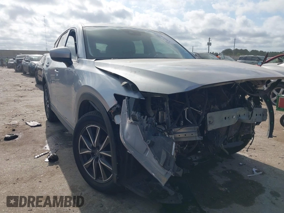 2018 Mazda CX-5 Grand Touring with VIN JM3KFADM6J0325626, listed as a IAAI auction lot 42054702 with 121,952 mi miles and . Bid and sale history available at DreamBid. Image 1.