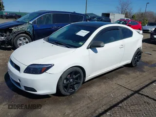 2005 Scion tC with VIN JTKDE177750004638, listed as a IAAI auction lot 41860203 with 184,800 mi miles. Bid and sale history available at carsss.com. Image 14.