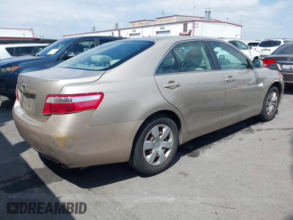 2007 Toyota Camry CE with VIN 4T1BE46KX7U716414, listed as a IAAI auction lot 42116250 with 104,298 mi miles and . Bid and sale history available at DreamBid. Image 4.