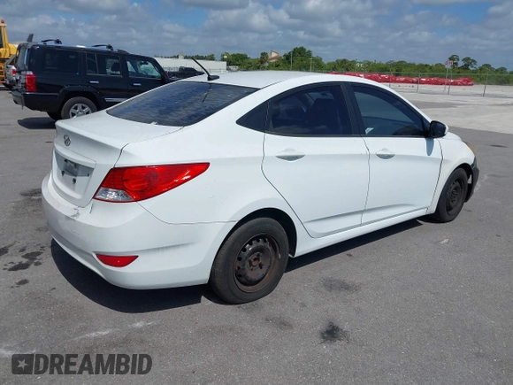 2014 Hyundai Accent GLS with VIN KMHCT4AE1EU590386, listed as a IAAI auction lot 42155202 with 248,545 mi miles. Bid and sale history available at carsss.com. Image 4.