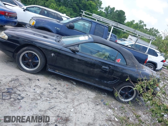 1998 Ford Mustang with VIN 1FAFP4442WF252712, listed as a IAAI auction lot 42428073 with 118,477 mi miles and . Bid and sale history available at DreamBid. Image 3.
