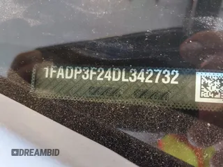 2013 Ford Focus SE с VIN 1FADP3F24DL342732, выставлен на аукционе IAAI как лот 42754169 с пробегом 157 117 миль миль и . История ставок и продаж доступна на DreamBid. Изображение 9.