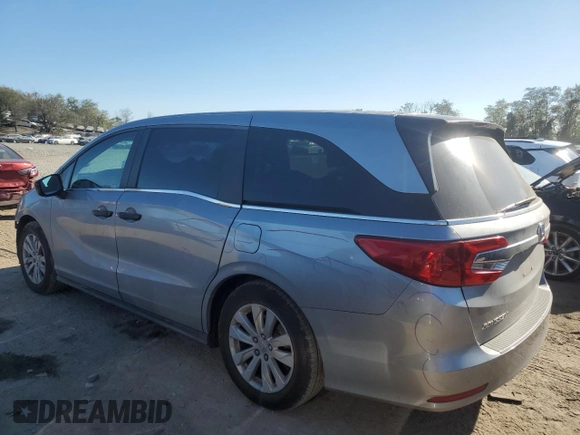 2018 Honda Odyssey LX with VIN 5FNRL6H22JB087152, listed as a Copart auction lot 76754974 with 73,057 mi miles and Salvage Title. Bid and sale history available at carsss.com. Image 2.