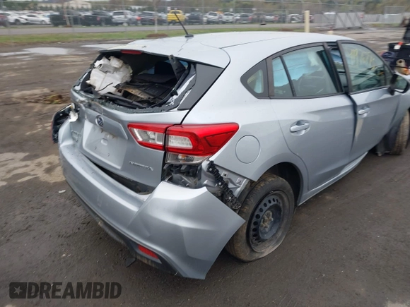2019 Subaru Impreza with VIN 4S3GTAA65K3757170, listed as a IAAI auction lot 41976773 with 100,056 mi miles and . Bid and sale history available at DreamBid. Image 4.