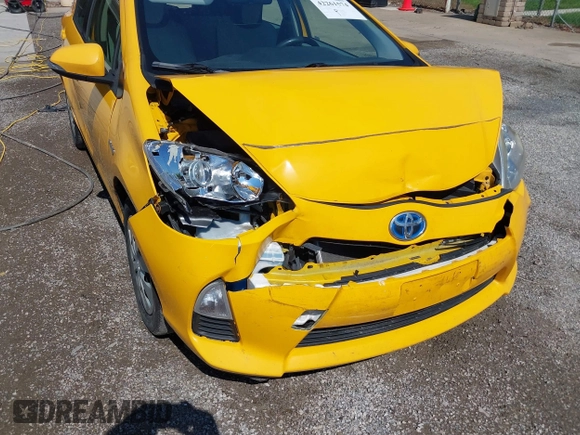 2014 Toyota Prius One z VIN JTDKDTB31E1066984, wystawiony jako IAAI lot #42261574 z przebiegiem 163 378 mil mil oraz . Historia ofert i sprzedaży dostępna na DreamBid. Obrazek 6.
