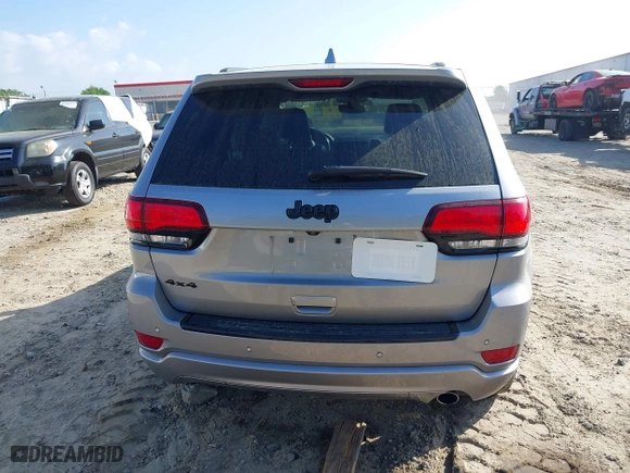 2018 Jeep Grand Cherokee Laredo E with VIN 1C4RJFAG0JC284927, listed as a IAAI auction lot 41964013 with 130,145 mi miles. Bid and sale history available at carsss.com. Image 16.