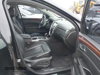 2015 Cadillac SRX Premium Collection z VIN 3GYFNDE3XFS576695, wystawiony jako IAAI lot #41612836 z przebiegiem Nie podano mil oraz . Historia ofert i sprzedaży dostępna na DreamBid. Obrazek 5.