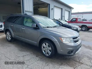 2012 Dodge Journey Crew with VIN 3C4PDDDG1CT225343, listed as a IAAI auction lot 42002901 with 197,347 mi miles and . Bid and sale history available at DreamBid. Image 1.