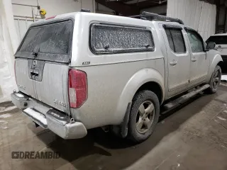 2006 Nissan Frontier LE with VIN 1N6AD07W96C436210, listed as a Copart auction lot 87704505 with 119,485 mi miles and Salvage title. Bid and sale history available at DreamBid. Image 3.