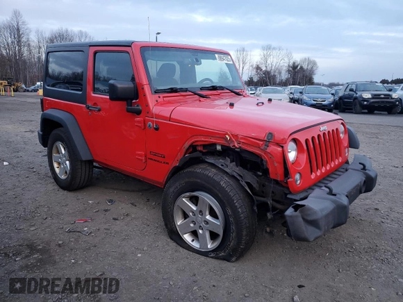 2015 Jeep Wrangler Willys Wheeler with VIN 1C4AJWAG9FL543998, listed as a Copart auction lot 88947025 with 142,433 mi miles and Salvage title. Bid and sale history available at DreamBid. Image 4.