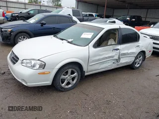 2000 Nissan Maxima GXE z VIN JN1CA31A4YT206065, wystawiony jako IAAI lot #41952514 z przebiegiem 2 953 347 mil mil oraz . Historia ofert i sprzedaży dostępna na DreamBid. Obrazek 13.