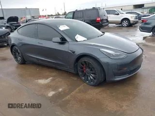 2023 Tesla Model 3 Performance z VIN 5YJ3E1EC3PF577351, wystawiony jako IAAI lot #41468800 z przebiegiem 29 175 mil mil oraz . Historia ofert i sprzedaży dostępna na DreamBid. Obrazek 1.