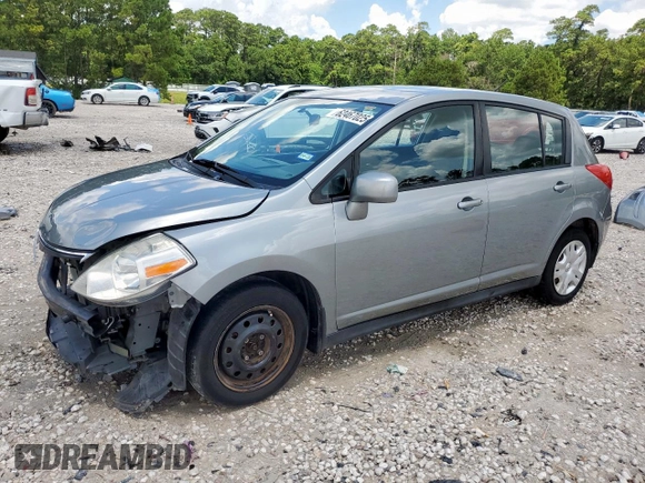 2010 Nissan Versa S with VIN 3N1BC1CP9AL372491, listed as a Copart auction lot 62467025 with 68,977 mi miles and Salvage title. Bid and sale history available at DreamBid. Image 1.