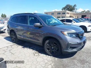2021 Honda Pilot Special Edition z VIN 5FNYF6H27MB008078, wystawiony jako IAAI lot #41949086 z przebiegiem 59 607 mil mil oraz . Historia ofert i sprzedaży dostępna na DreamBid. Obrazek 1.