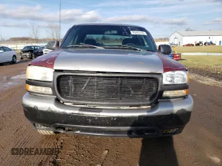 1999 GMC New Sierra 1500 SLE with VIN 2GTEC19TXX1543015, listed as a Copart auction lot 85465164 with 144,396 mi miles and Salvage Title. Bid and sale history available at carsss.com. Image 5.