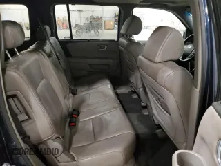 2009 Honda Pilot Touring z VIN 5FNYF48899B054320, wystawiony jako Copart lot #58948585 z przebiegiem 254 997 mil mil oraz Szkoda całkowita • Salvage title. Historia ofert i sprzedaży dostępna na DreamBid. Obrazek 11.